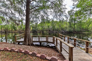 This canal-front home is move in ready and full of character and - photo 7