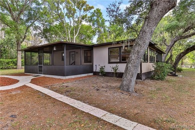 This canal-front home is move in ready and full of character and - photo 9