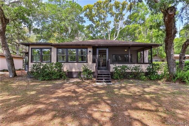 This canal-front home is move in ready and full of character and - photo 10