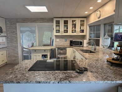 Welcome to this beautifully updated waterfront home located - photo 18