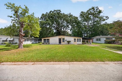 Completely renovated and move-in ready! This solid brick and - photo 2