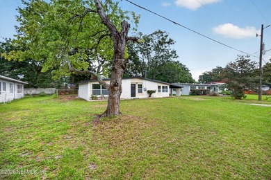 Completely renovated and move-in ready! This solid brick and - photo 4