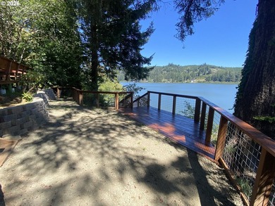 Charming Siltcoos Lakefront cabin with boat dock! End of road - photo 2