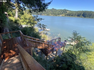 Charming Siltcoos Lakefront cabin with boat dock! End of road - photo 3