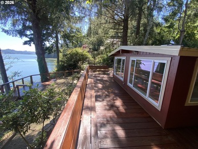 Charming Siltcoos Lakefront cabin with boat dock! End of road - photo 7