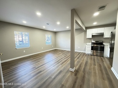 Completely renovated and move-in ready, this charming 2-bedroom - photo 3