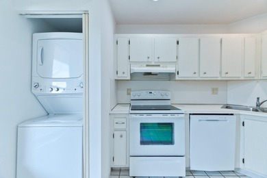 WELCOME TO THIS AMAZING MAINTAINED 2 BR, BATH CONDO IN DESIRABLE - photo 2