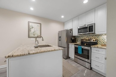 Stunning waterfront 2 bedroom/2 bath condo in the highly - photo 14
