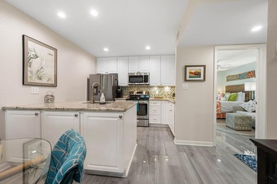 Stunning waterfront 2 bedroom/2 bath condo in the highly - photo 18