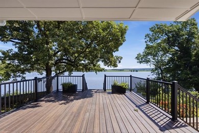 Perched high on the bluff overlooking the waters of Lake Hudson - photo 34