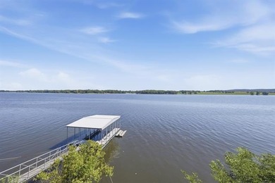 Perched high on the bluff overlooking the waters of Lake Hudson - photo 40