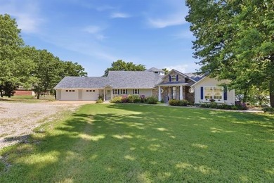 Perched high on the bluff overlooking the waters of Lake Hudson - photo 48
