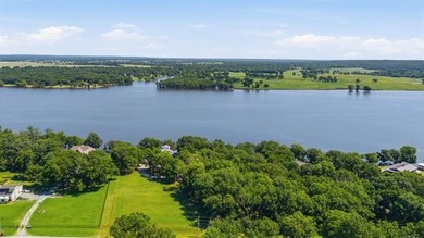 Perched high on the bluff overlooking the waters of Lake Hudson - photo 49