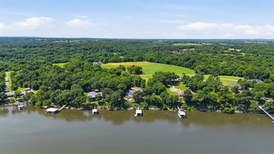 Perched high on the bluff overlooking the waters of Lake Hudson - photo 50