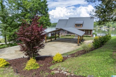 Experience lake living at its finest on year-round water on the - photo 2