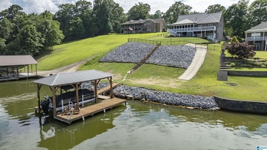 Experience lake living at its finest on year-round water on the - photo 3