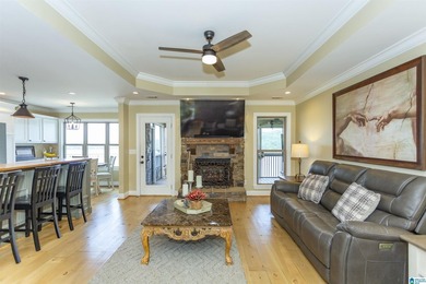 Experience lake living at its finest on year-round water on the - photo 8