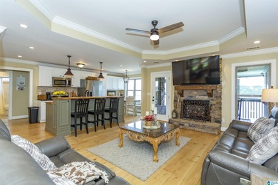 Experience lake living at its finest on year-round water on the - photo 9