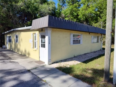 Stand alone business building on the main paved road in - photo 1
