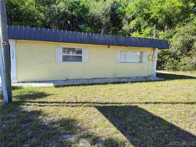 Stand alone business building on the main paved road in - photo 2