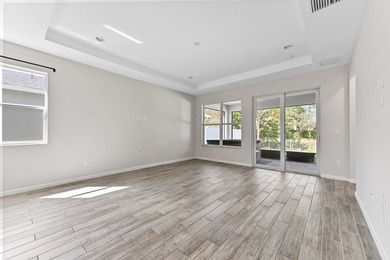 Enter through a statement-making modern frosted-glass front door - photo 5
