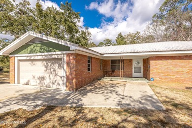 Enjoy waterfront living on the bayou in Gautier, conveniently - photo 6