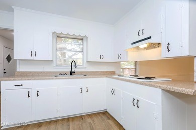 Enjoy waterfront living on the bayou in Gautier, conveniently - photo 9