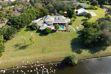 Lake Home For Sale in Palm Beach Gardens, Florida