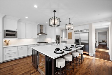 Perched atop a premium 9,000+ sq. ft. west-facing view lot in - photo 16