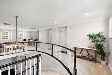 Perched atop a premium 9,000+ sq. ft. west-facing view lot in - photo 31