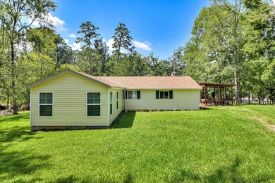 Lakefront living at its best! This property features a private - photo 2