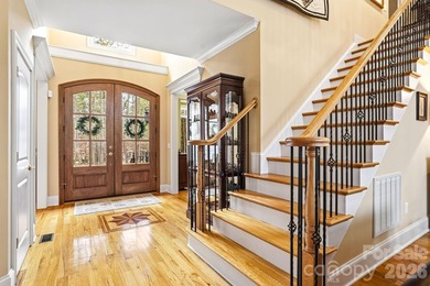 Tucked inside the gated Pebble Bay community, this custom-built - photo 2