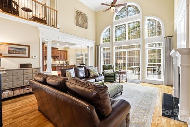 Tucked inside the gated Pebble Bay community, this custom-built - photo 4