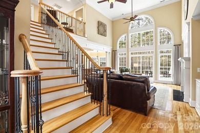 Tucked inside the gated Pebble Bay community, this custom-built - photo 5