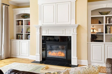 Tucked inside the gated Pebble Bay community, this custom-built - photo 9