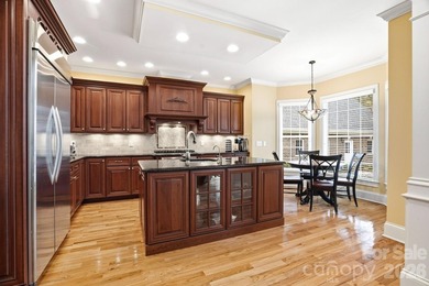 Tucked inside the gated Pebble Bay community, this custom-built - photo 10