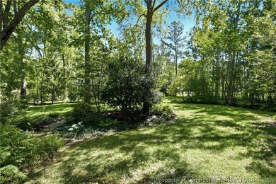 ONE OF A KIND! Nestled on nearly two acres in the heart of - photo 41