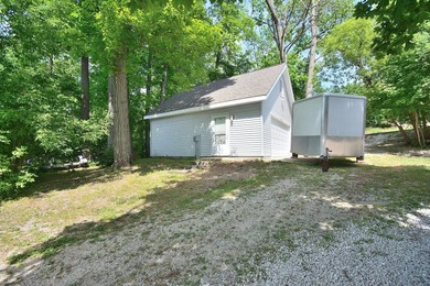 Rare Okauchee Lake home with 73' frontage on over 3/4 acre! Flat - photo 20