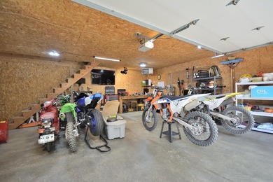 Rare Okauchee Lake home with 73' frontage on over 3/4 acre! Flat - photo 21