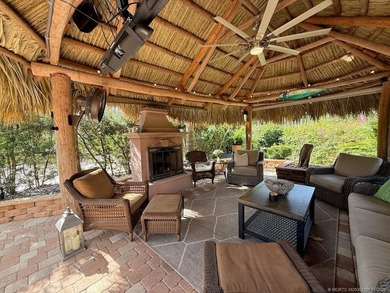 YOUR TROPICAL OASIS AWAITS! Ideally situated near the north - photo 1