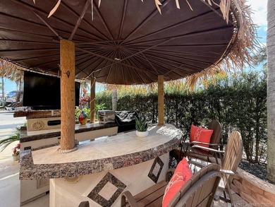 YOUR TROPICAL OASIS AWAITS! Ideally situated near the north - photo 3