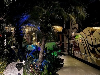 YOUR TROPICAL OASIS AWAITS! Ideally situated near the north - photo 5