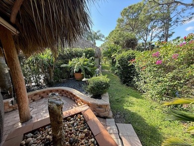 YOUR TROPICAL OASIS AWAITS! Ideally situated near the north - photo 9