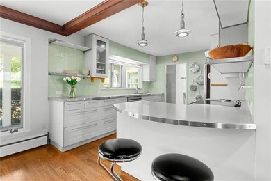 Nestled in a picturesque setting overlooking Easton's Pond, this - photo 18