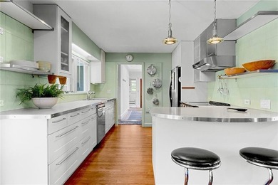Nestled in a picturesque setting overlooking Easton's Pond, this - photo 19