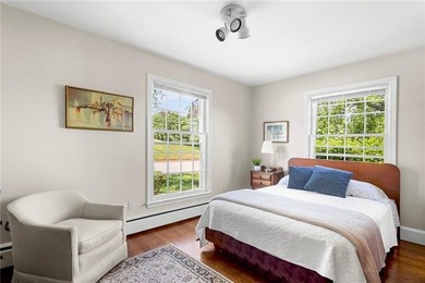 Nestled in a picturesque setting overlooking Easton's Pond, this - photo 35
