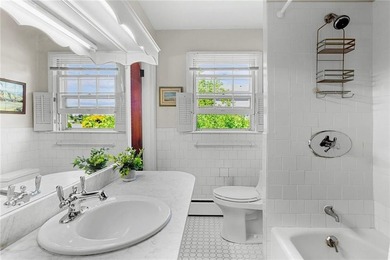 Nestled in a picturesque setting overlooking Easton's Pond, this - photo 36