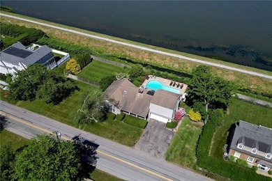 Nestled in a picturesque setting overlooking Easton's Pond, this - photo 48