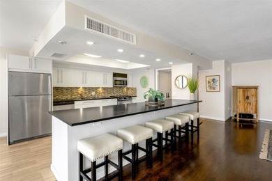 RARELY AVAILABLE BEACHFRONT VILLA OFFERING EFFORTLESS - photo 9