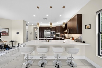 Welcome to this stunning Somerset model pool home on a serene - photo 17